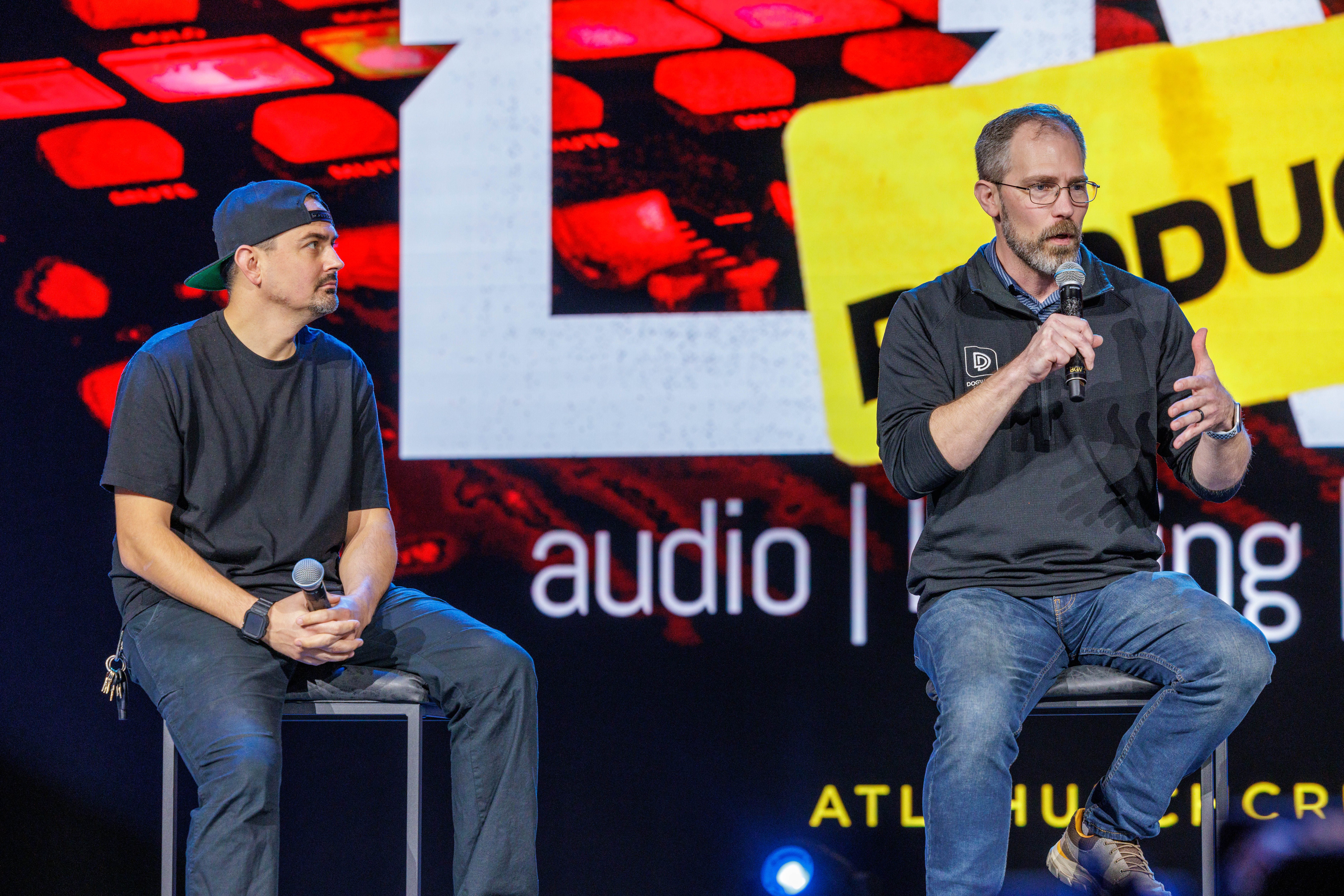 Two audio leaders answering questions during a conference session