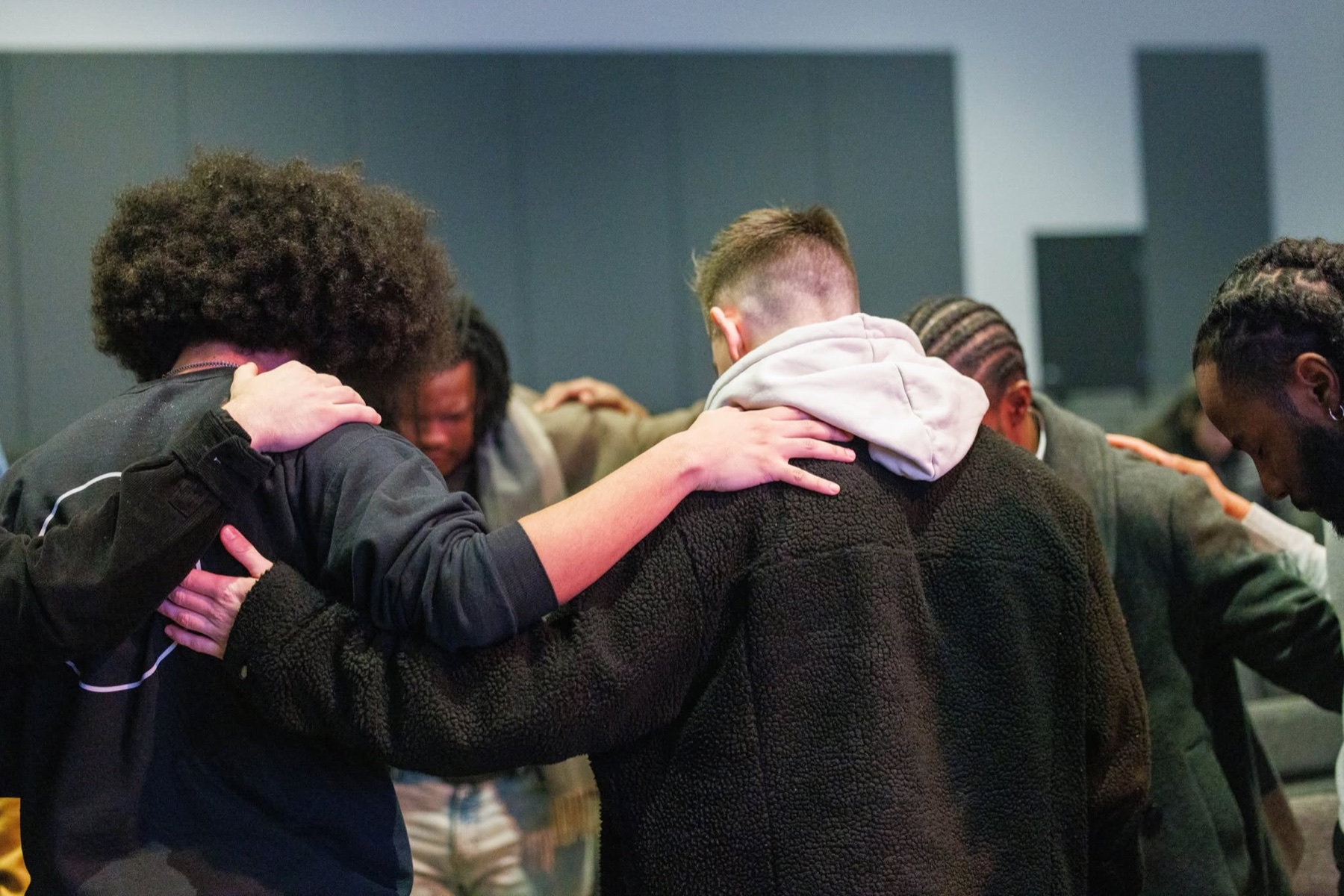 Church creatives praying together during the conference