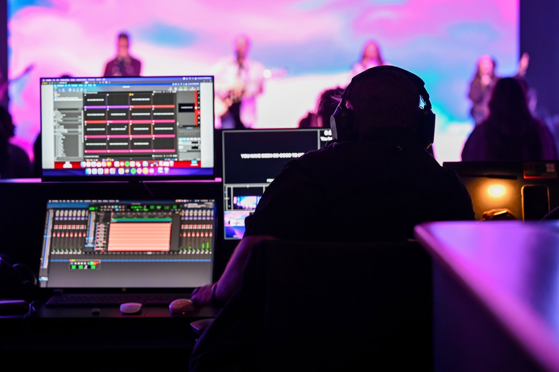 A production operator working behind the scenes